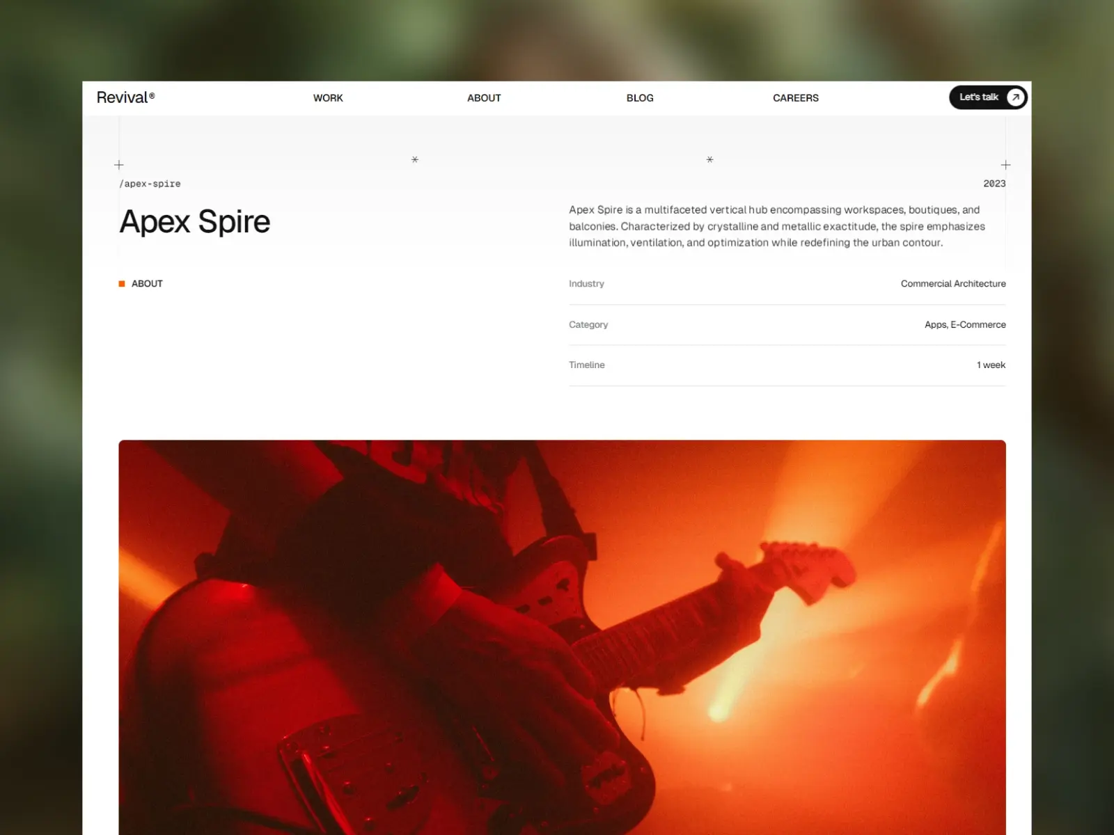 Website display of 'Apex Spire' project by Revival, featuring modern design elements. Text describes a vertical hub with workspaces. Image below shows a musician playing an electric guitar under dramatic red lighting.